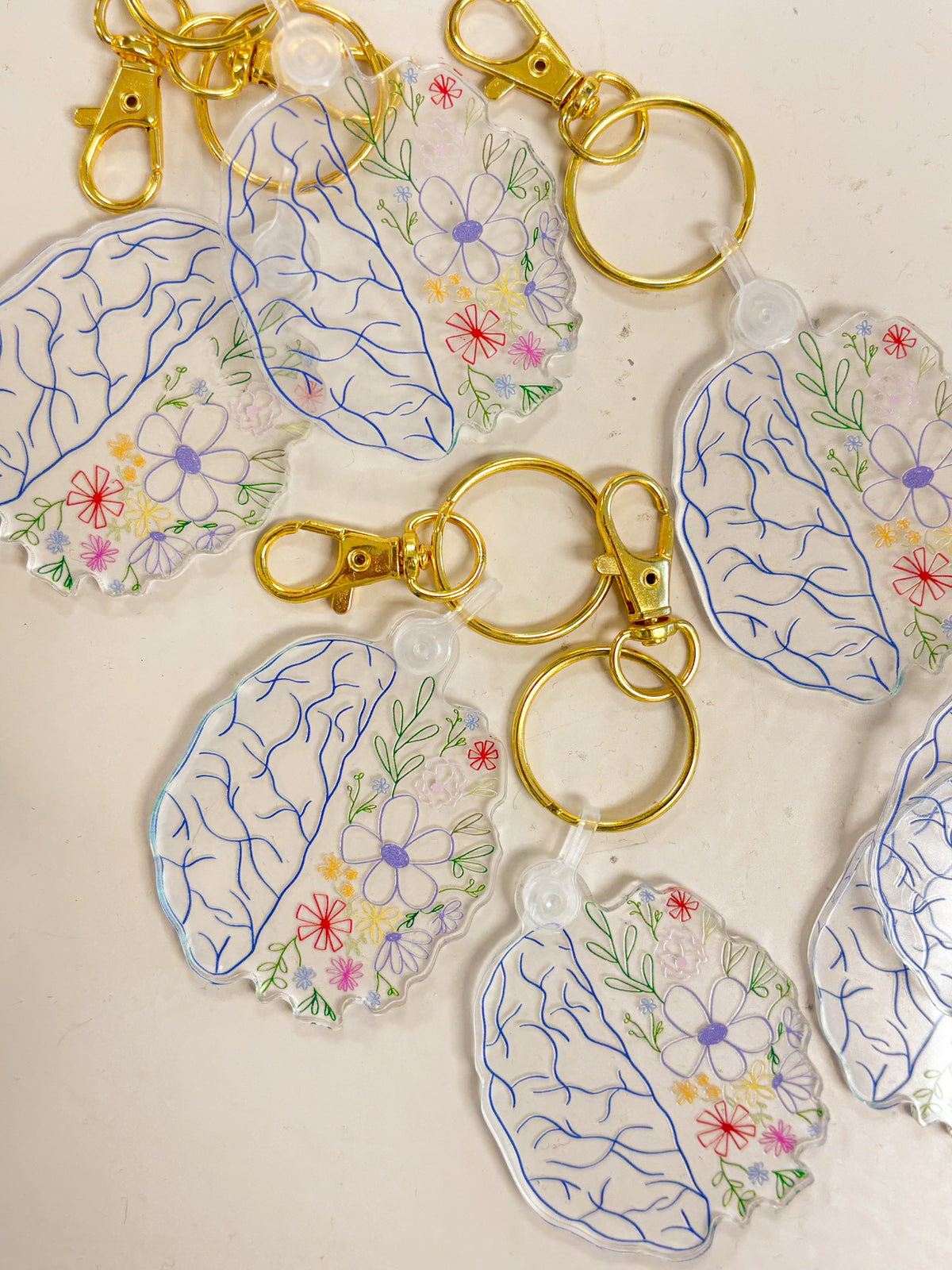floral brain keychain